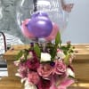 Send some love! This lovely arrangement comes with a personalized balloon and