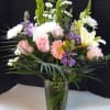 Asiatic Lilies,  Roses, Gerbera Daisies, Bell of Ireland,  Stock, Statice