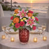 A radiant blend of warm pinks, glowing oranges, and soft golden tones