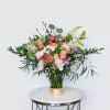 Enjoy a beautiful arrangement with the freshest flowers of the day created