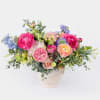 Oh so pretty! Dreamy pastel premium seasonal florals arranged in modern footed