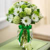 Ring in the Holiday with this adorable vase filled with green and