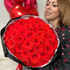Gorgeous red roses in a black wrap
Standard - 48-50 roses 
Deluxe -