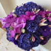 A mix of premium flowers with Hydrangas, Orchids and Tulips arranged round