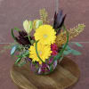 a stunning yellow arrangement including gerbera daisies.