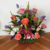 This bright and uplifting bouquet is a cheerful collection of pink lilies
