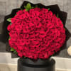 A breathtaking composition of 100 premium red roses arranged in a flawless