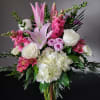 This exquisite bouquet is sure to delight that special person.  Designed