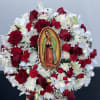 Wreath approximately 18&rdquo; Guadalupe is laminated cardboard 