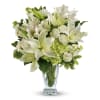 A graceful, airy arrangement featuring creamy white and blush blooms designed in
