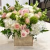 A Beautiful Wooden Box arrangement including Hydrangeas, Snapdragons, Roses, Spray Roses, Lisianthus