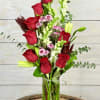 Ignite the flames of your love with this red rose arrangement. A