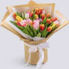 Wrapped tulip bouquet 
Mixed Color of tulips vary (colors vary based on