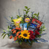 Flowers for the heart, snacks for the soul. This basket is a