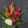 A bold and romantic tropical design featuring red roses, exotic ginger and
