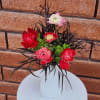 Anemone Luxe

Bold yet artfully composed, this striking arrangement showcases layered anemones in