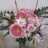pink gerbers, pink alstro,  pink carnations and white daisies