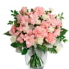Pink and white flowers including alstroemeria, carnations and mini carnations arranged in