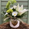 Show your love with this elegant bouquet which features a white lily
