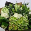 Let our design team create a beautiful mix of loose wrapped flowers