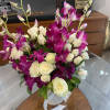 Spray roses and debdrobium orchids 