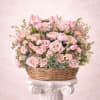 Brighten any space with our Elegant Flower basket Arrangement! Bursting with vibrant