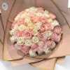 A stunning bouquet of 50 premium roses in soft pink and ivory