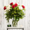 18 Red and white roses, symbolizing unity are arranged in a classic