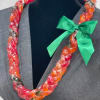 Add a delicious "twist" to the traditional lei with our popular Li
