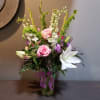 A luscious bouquet to celebrate spring in MN!

This arrangement measures 31"Tx20"W and