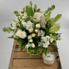 Introducing our all white elegant flower arrangement, a timeless and sophisticated masterpiece