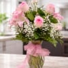 A beautiful handcrafted floral arrangement designed with fresh premium flowers. Perfect for