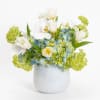A white glass vase with blue hydrangea, orchids, tulips and viburnum. 

Special