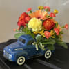 An arrangement made in the back of a little blue pickup!

*Flowers Subject
