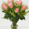 Standard  18 Roses in a vase
Deluxe   24 roses in