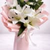 Experience refined beauty with our Blush Elegance Lily Bouquet, featuring premium white