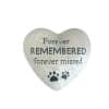 Heart-shaped memorial stone with paw prints and text