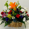 Sweet upcycled basket - (styles may vary)  filled with Seasonal blooms