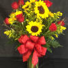 Beautiful long stem red roses beautifully designed with splashes of bursting sunflowers