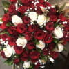 25 OFF WHITE ROSES, 25 RED ROSES WITH BABY BREATH AND GOLD