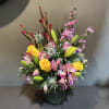 Bright bouquet perfect for any table in the house!

Measures approx. 20"Tx12"W and