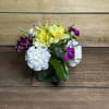 A spring mix of carnations, mini carnations, alstroemeria, and caspia