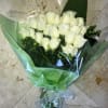 24 White Roses Long Stem Wrapped Bouquet. (available in any color).

