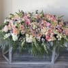 Funeral arrangement with mix of premium flowers 
Standard- as you see on