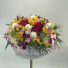 Mix of flowers in a vase beautifully created bu our designers 