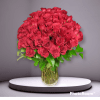 Exquisite 5 dozen of red roses design in a crystal vase