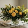 Our Signature Studio Centerpiece
A lush, medium-scale design that perfectly balances vibrant, sunny