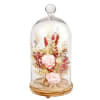 Description
A preserved real rose is arranged among a mix of natural botanicals