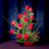 Stylized arrangement of Red Roses.  Something out of the ordinary for