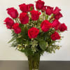 24 red roses, in a glass vase with greens and filler, 
30
